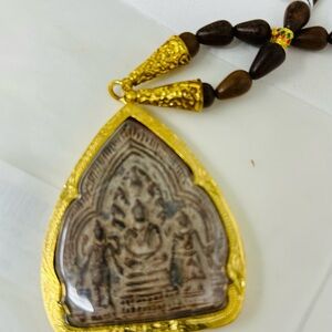 Buddhist Amulet pendant on beaded necklace
